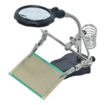 عدسة مكبرة مع حامل لوحات صغيرة